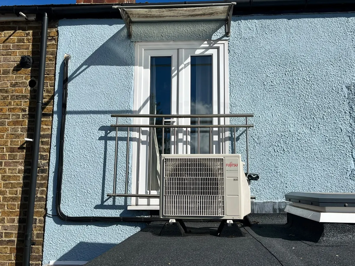 Fujitsu outdoor condenser installed by Warner Climate Co.